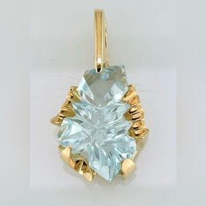 14k yellow gold blue topaz pendant